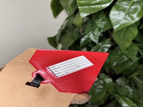 علامة حقيبة سفر سوبرمان