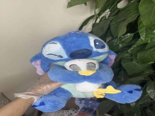 دمية ستيتش وبطوط