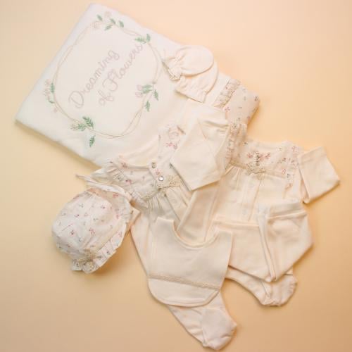 طقم مواليد 7 قطع بطبعات الورود