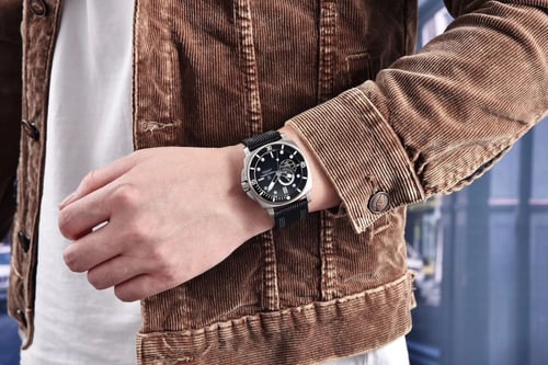 ساعة رجالية بسير ناتو مع الجلد الصناعي بلون اسود م...