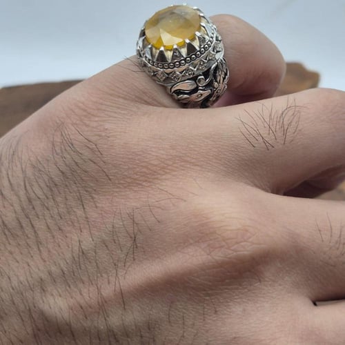 خاتم ياقوت اصفر متوج بـــ 4 حبات الماس