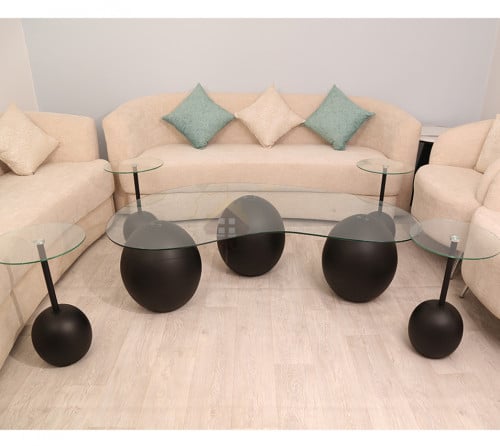 طقم طاولة رخام صناعي شكل كره لون أسود وسطح زجاج مع...