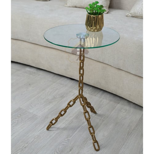 طاولة خدمة قاعدة حديد لون ذهبي وسطح زجاج شفاف