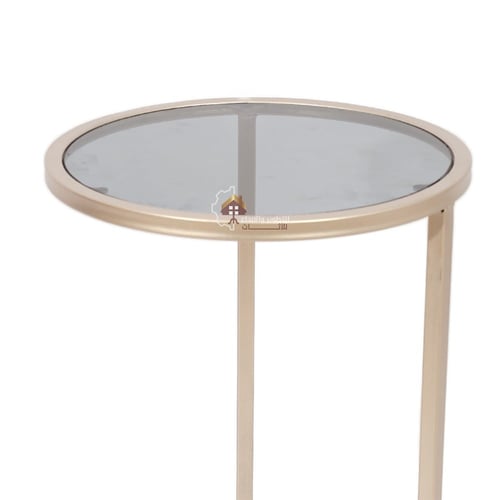 طاولة خدمة قاعدة حديد لون شمباني سطح زجاج اسود شفا...