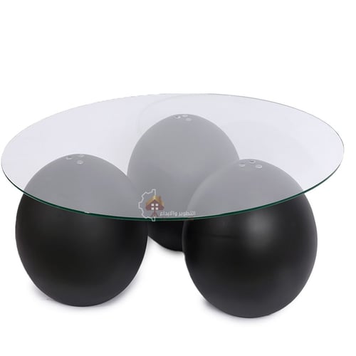 طاولة تقديم فوق كور من الرخام الصناعي لون اسود ناع...