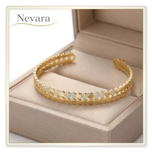 Open gold cuff with diamond accent
