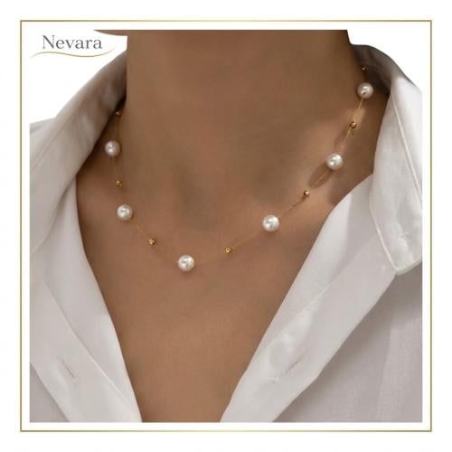 15. Delicate Gold Pearl Necklace
