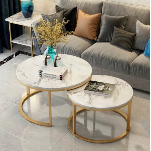 طاولتين متداخله ذهبيه من هوم تيبل بسطح بديل الرخام