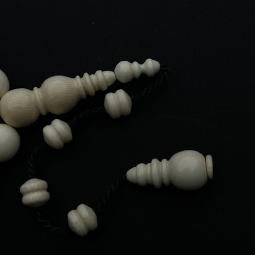 عاج ناب الفيل مدور