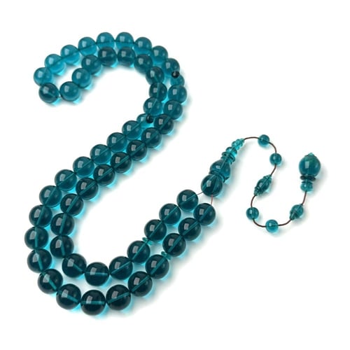 تركوازي شفاف - ورشة حسن سكر