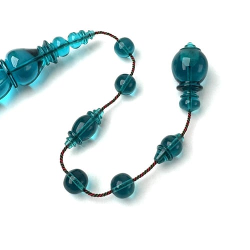 تركوازي شفاف - ورشة حسن سكر