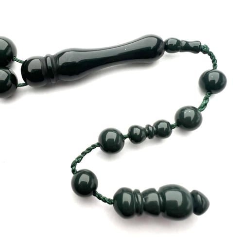 زيتي غامق صك تمليكة