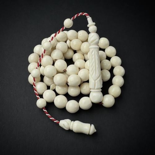 عظم جمل معالج منقوش - دائري