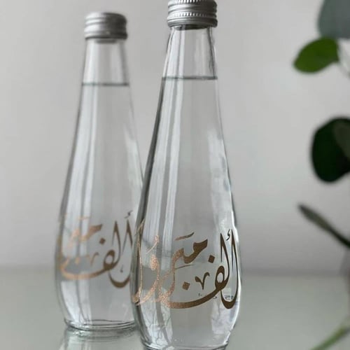 طباعة على علب مياة زجاج