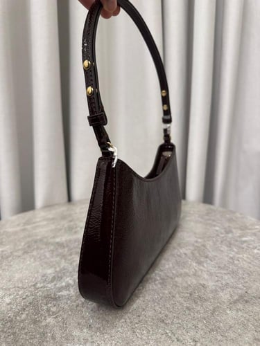 شنطة كتف عنابي توري بورش