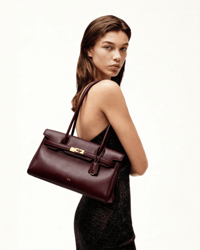 شنطة جي دبليو بي عنابي