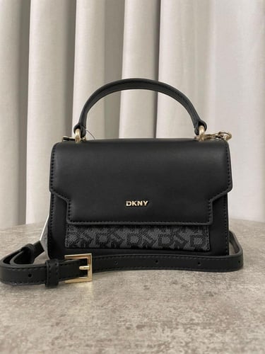 شنطة دكني بيج لوقو ذهبي