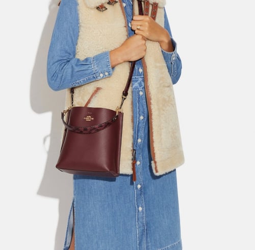 شنطة كوتش سمول عنابي