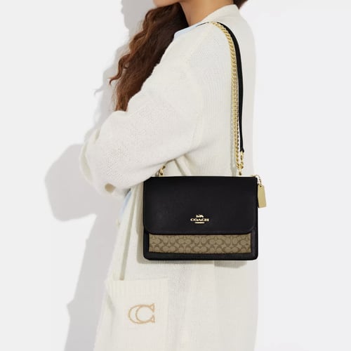 شنطة اسود وبيج من كوتش