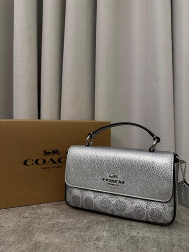 شنطة كوتش فضي