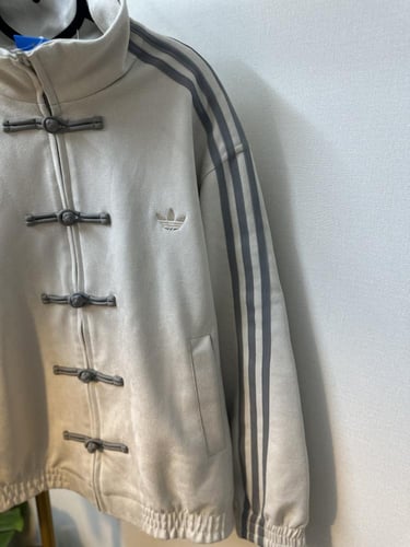 جاكيت اديداس نسخة السنه الصينيه