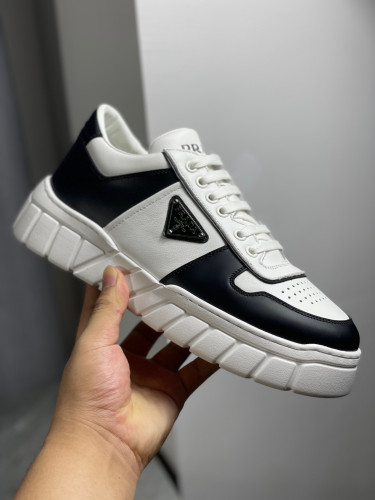 Prada logo-plaque low-top sneakers