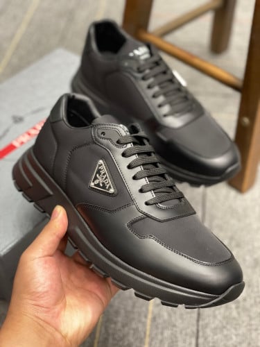 Prada PRAX 01 Re-Nylon and brushed leather sneaker...