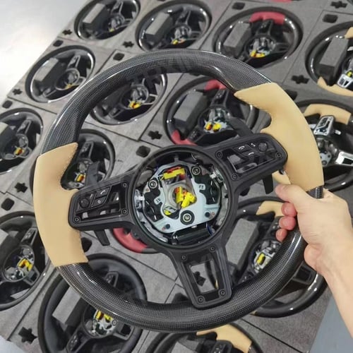 عجلة القيادة من الكاربون فايبر مع أزرار مشغل الوسا...