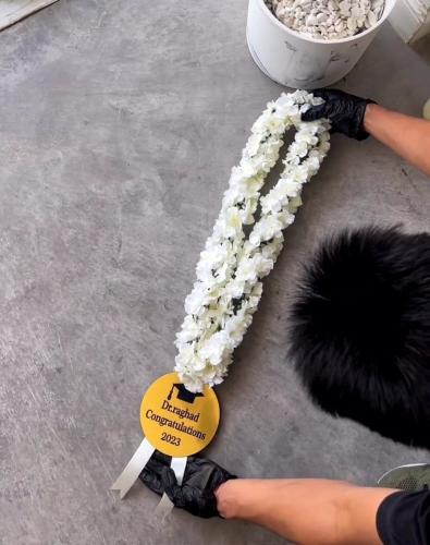 تعليقة تخرج بالاسم مع ورد