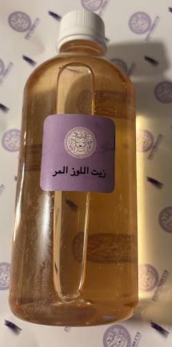 زيت اللوز المر العضوي ل تفتيح الجسم