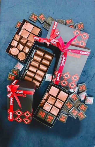 نصف كيلو شوكولاته دارك حشوات منوعه 1 كيلو