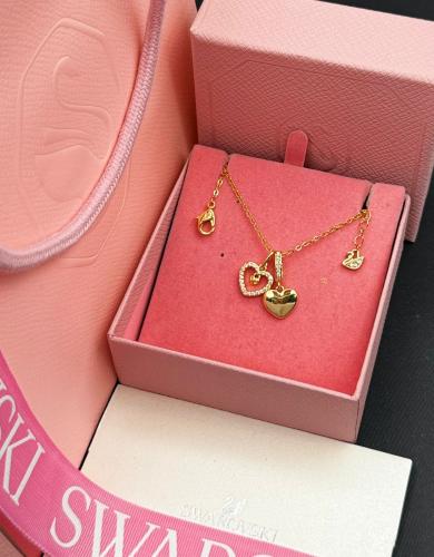 سلسال Swarovski قلبين ذهبي