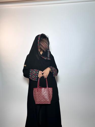 عباية بتلاء