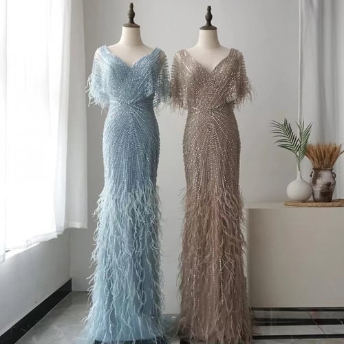 فستان تطريز ريش بأكمام