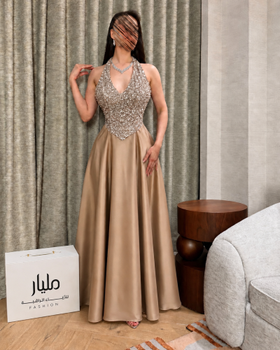 فستان سهرة ترف الشامبين المطرز