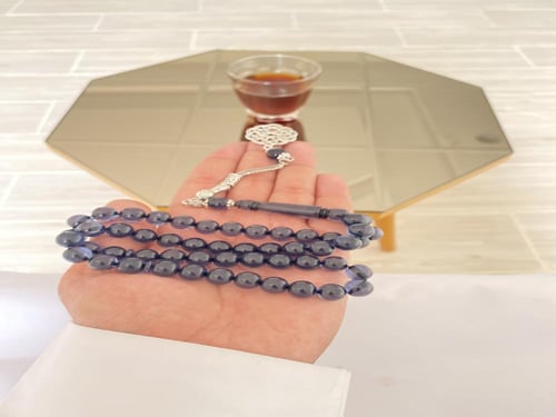 سبحة بكلايت شفاف اسود مكحل