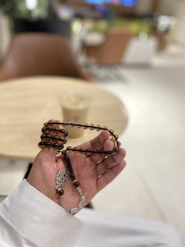 سبحة بكلايت بني عسلي مكحل بأسود