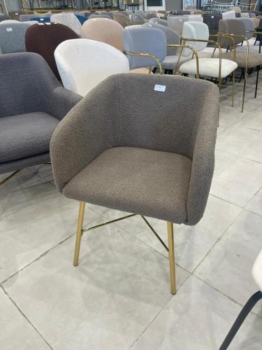 Single chair with gold accents