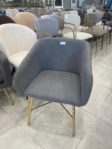 Single chair with gold accents