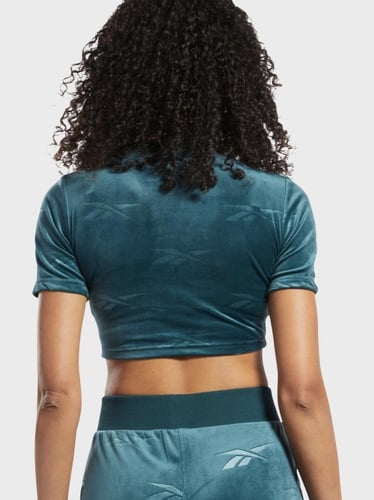 ريبوك, بلوزة بياقة عالية M