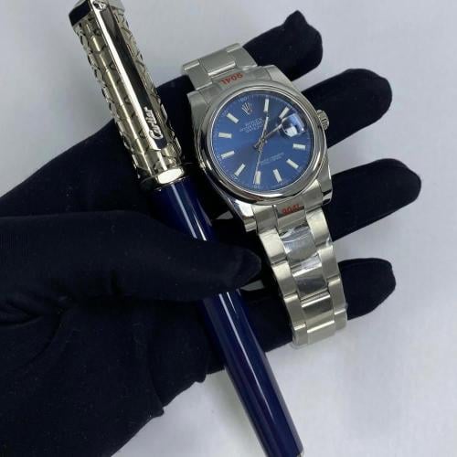 ساعة رولكس و قلم كارتير