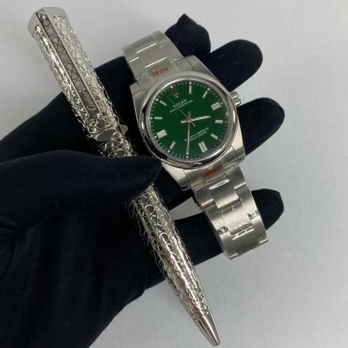 ساعة رولكس و قلم كارتير