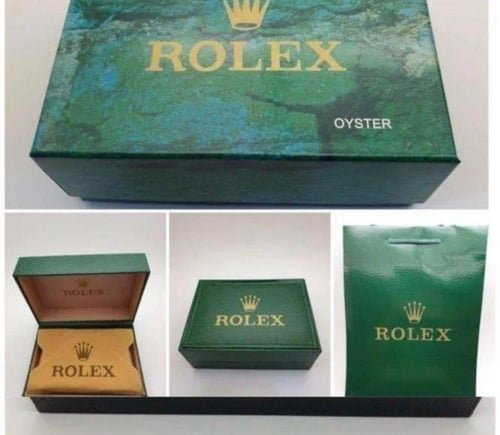 ساعة رولكس و قلم كارتير