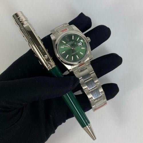 ساعة رولكس و قلم كارتير