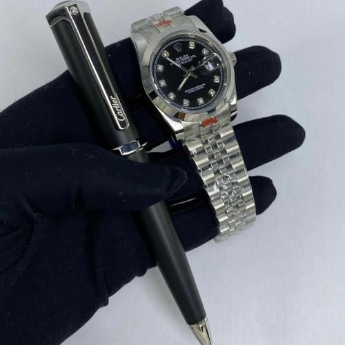 ساعة رولكس و قلم كارتير