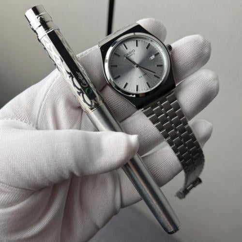 ساعة كاسيو و قلم كارتير