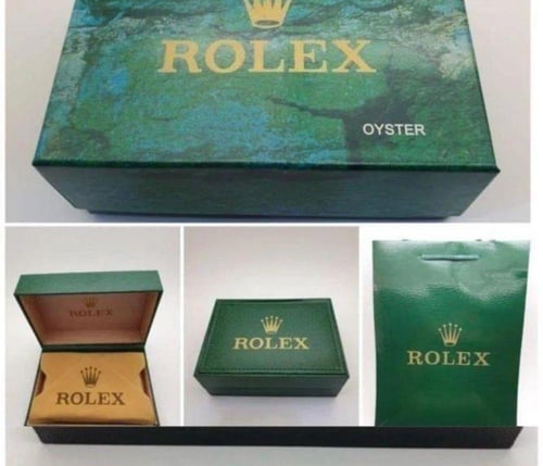 ساعة رولكس و قلم كارتير