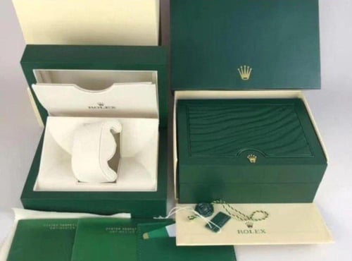 ساعة رولكس و قلم كارتير