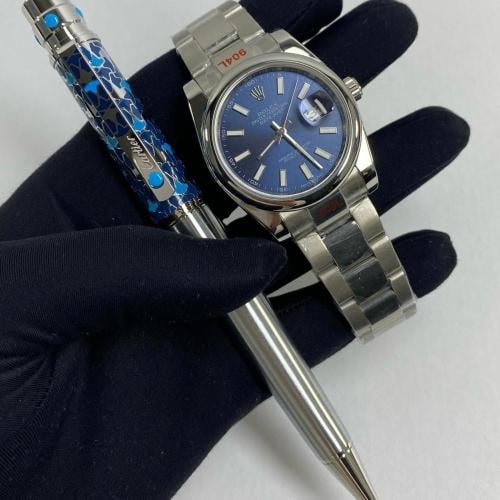 ساعة رولكس و قلم كارتير