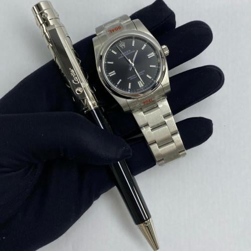 ساعة رولكس و قلم كارتير